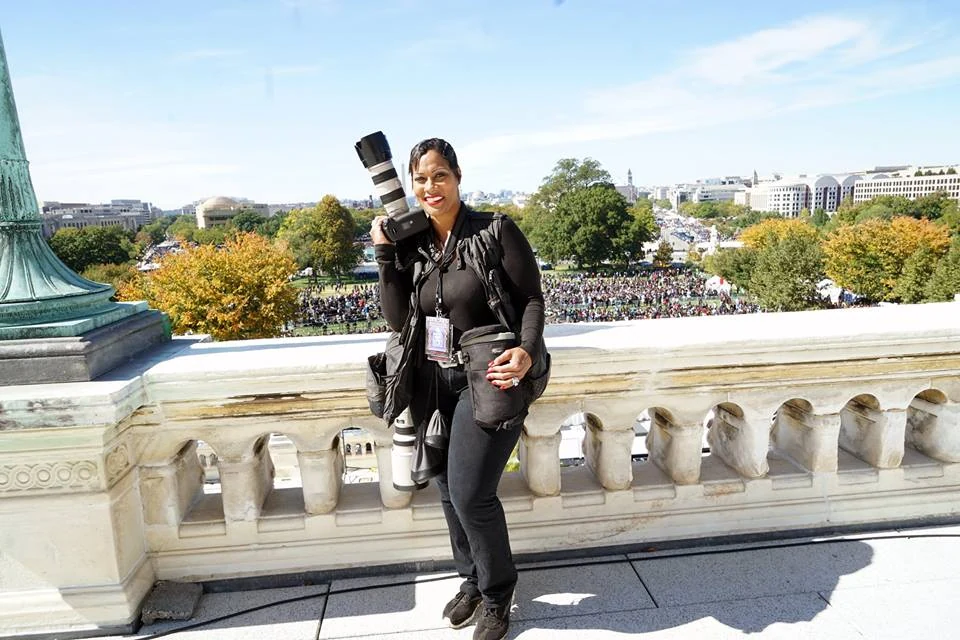 Monica Morgan photographing in Washington, D.C.